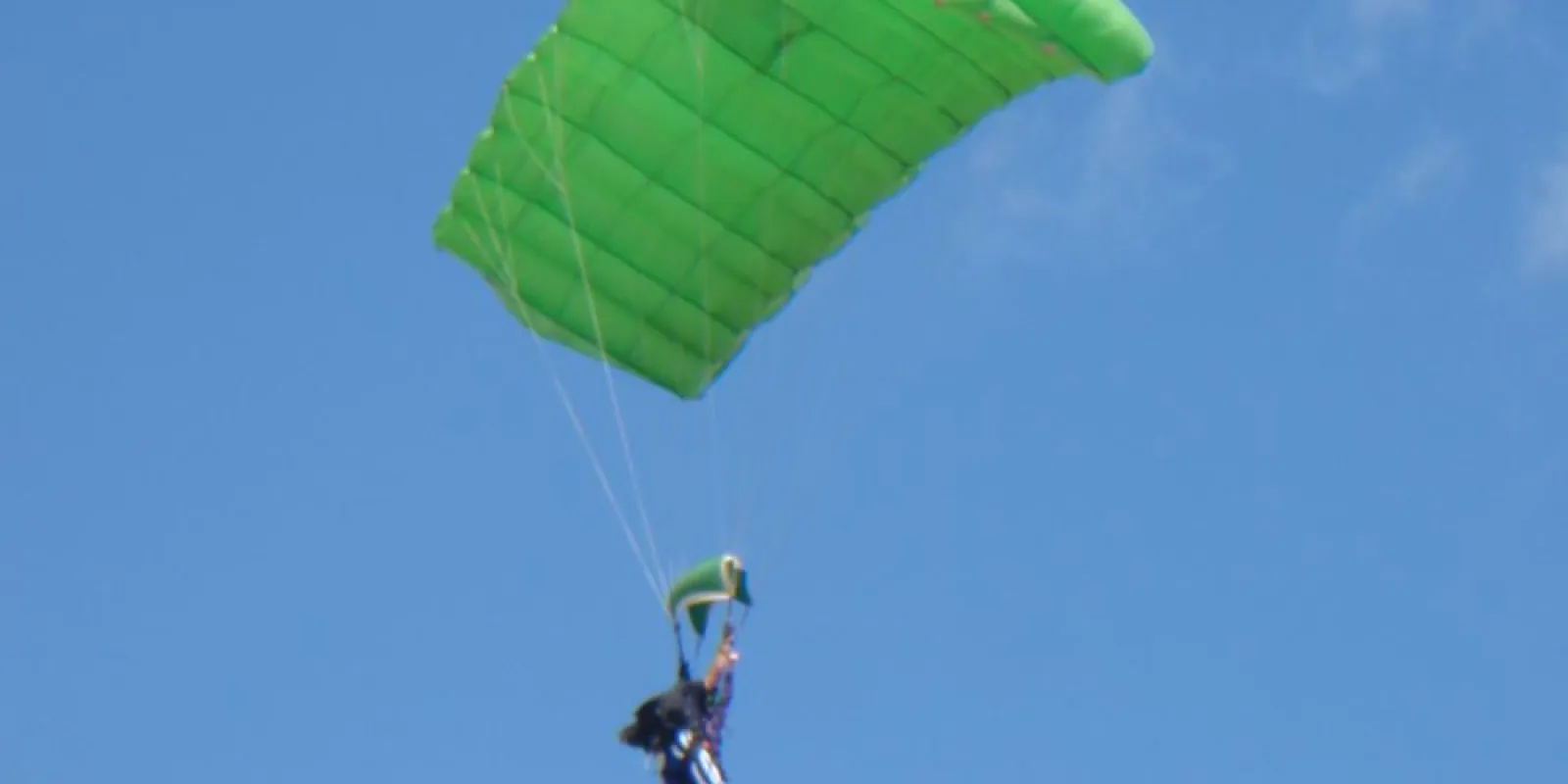 two people under a parachute