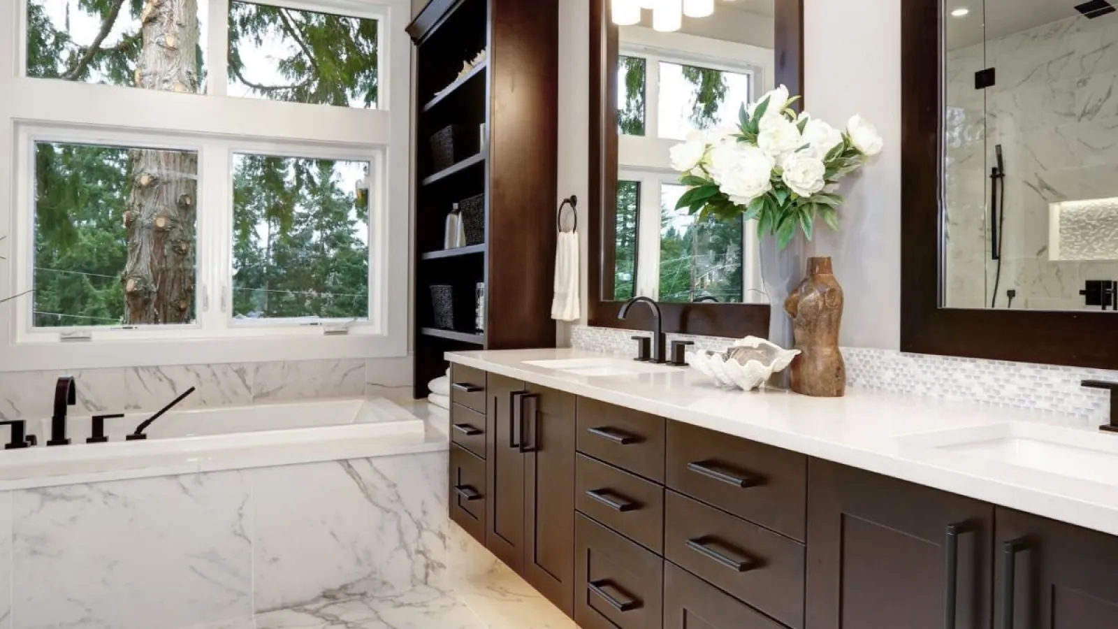 a bathroom with a sink and a large window