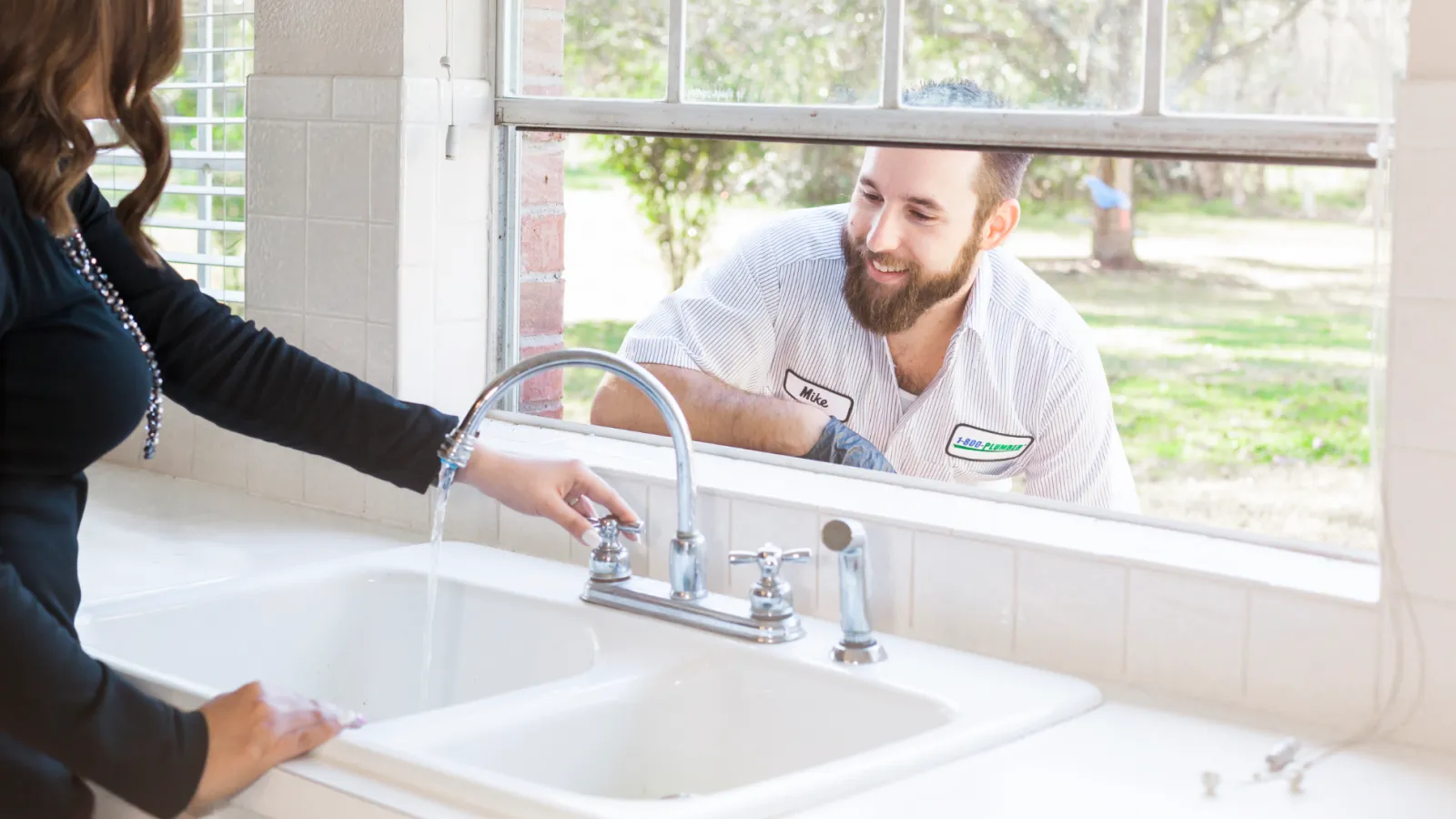 a woman using a sink