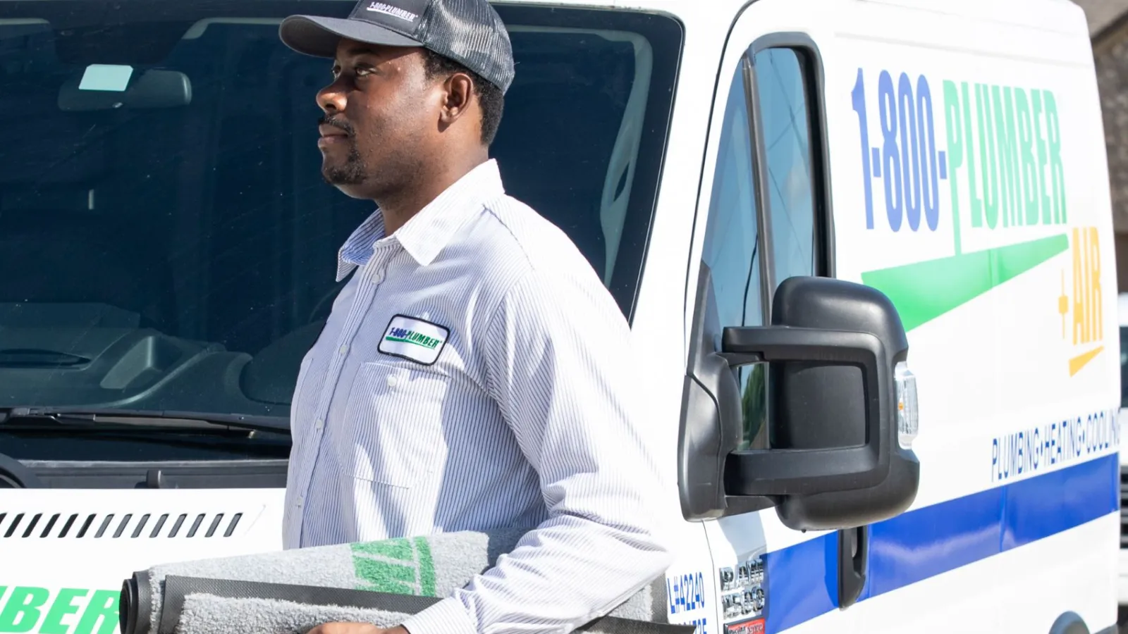 a large white truck parked on the side of a road