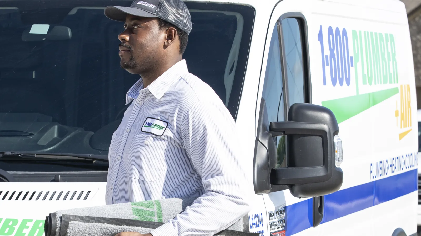 a man riding on the back of a truck