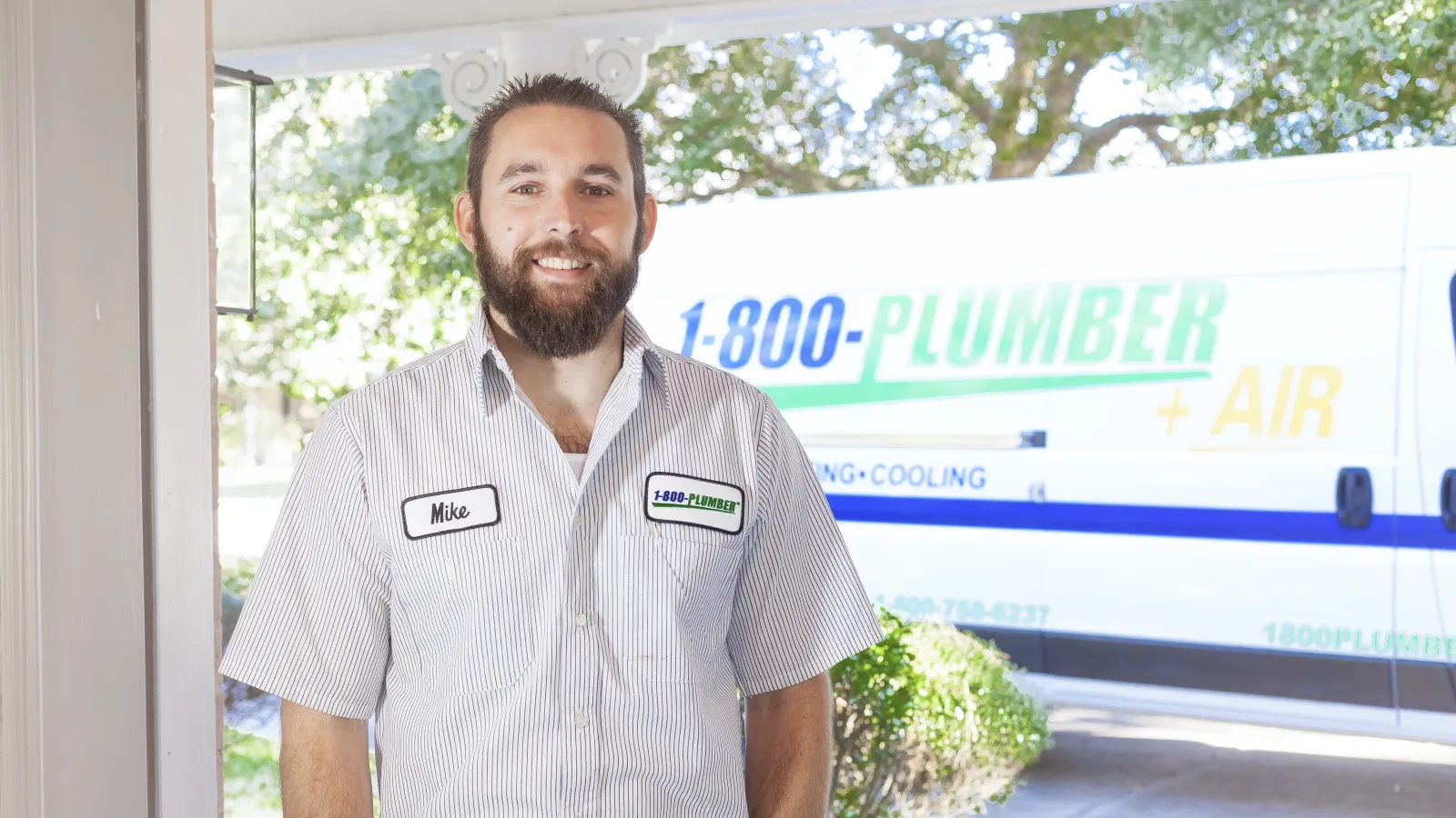 a man standing in front of a van