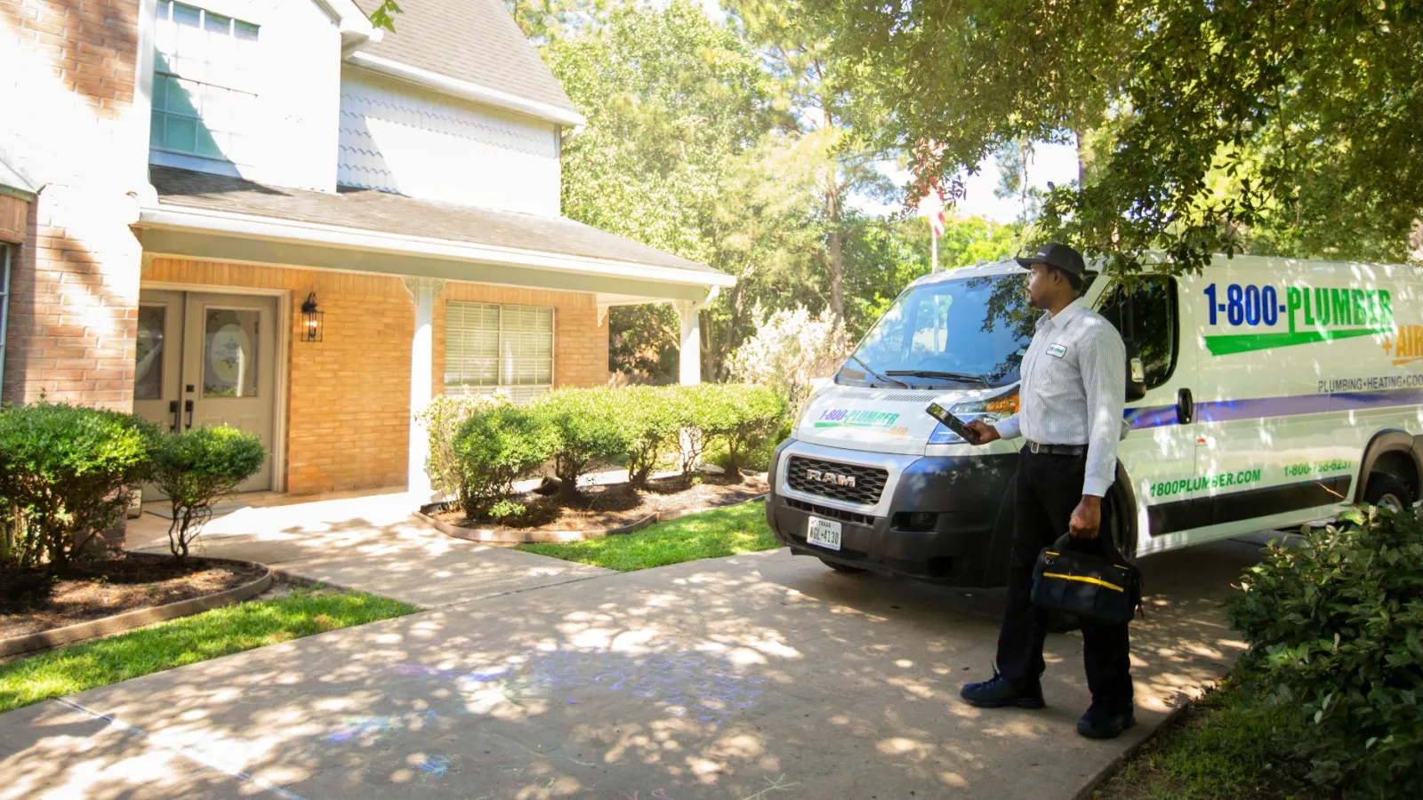 a man walking in front of a van