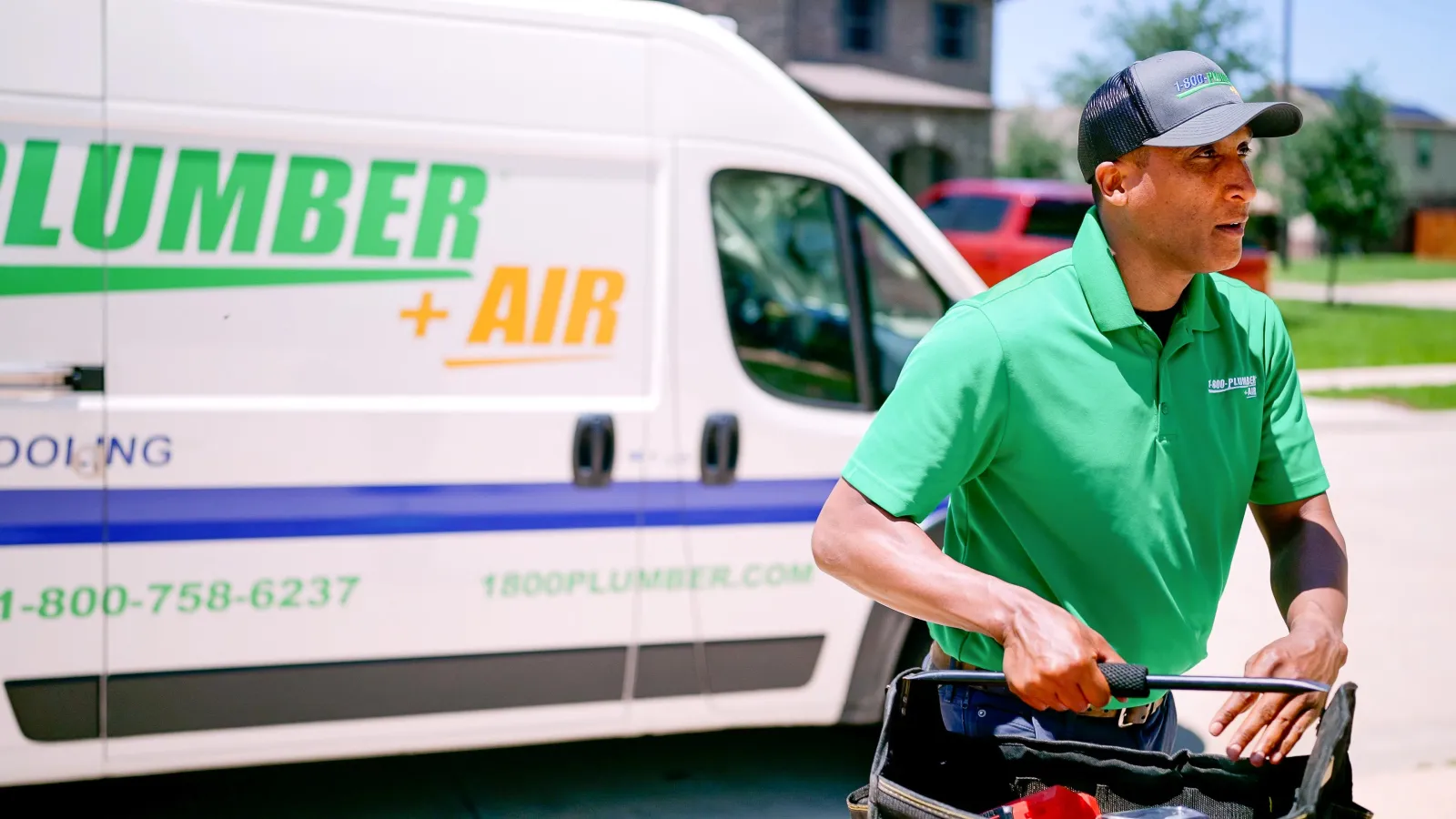 A Richmond emergency cooling technician with tools