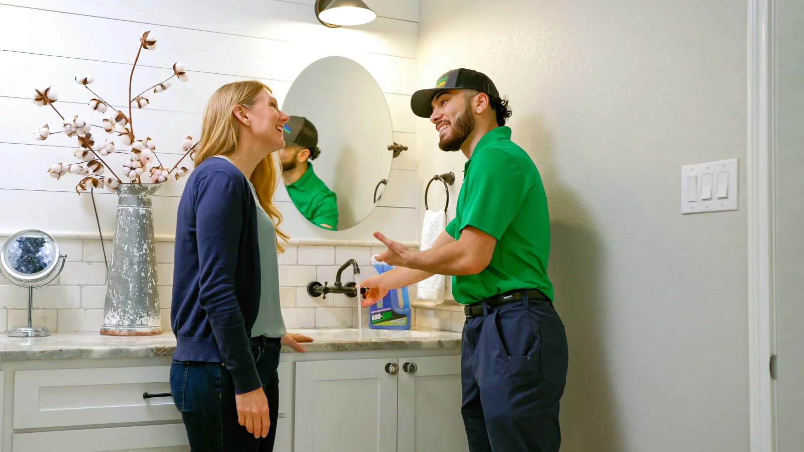 A Cypress plumber repairs a bathroom sink