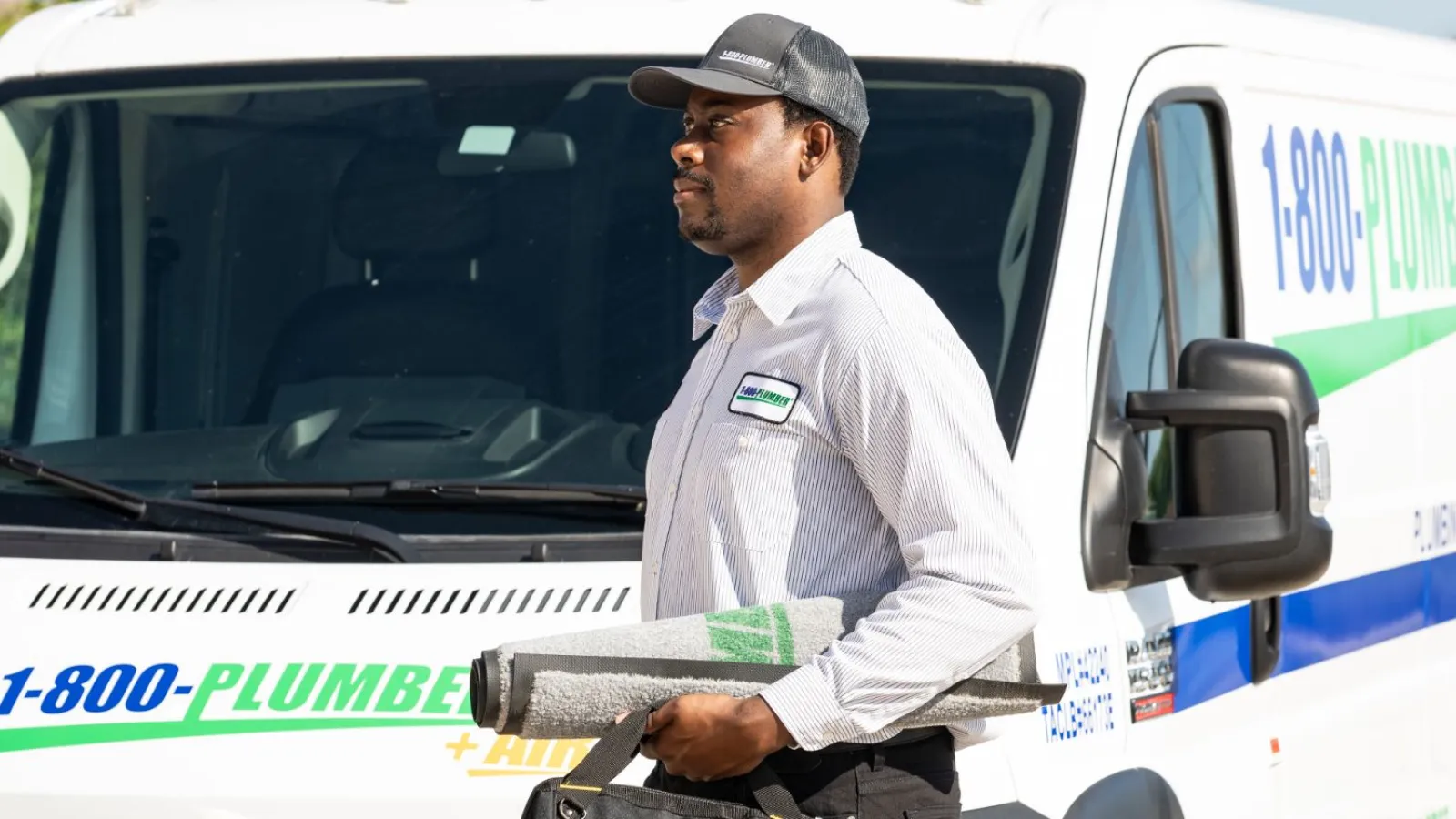 man in front of van