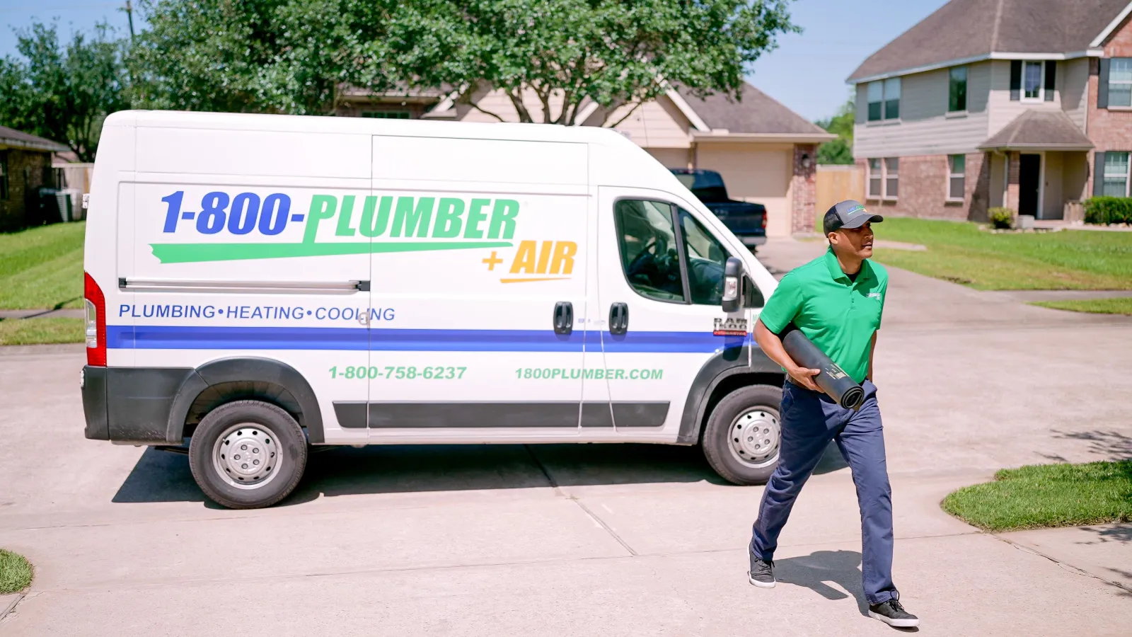 A Dallas bathroom plumber arrives in a van
