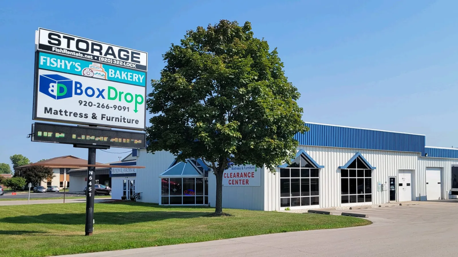 a building with a sign in front