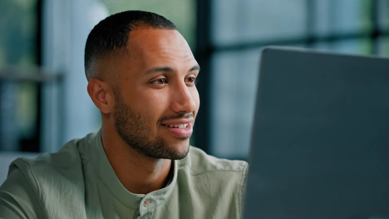 a man looking for information on a computer