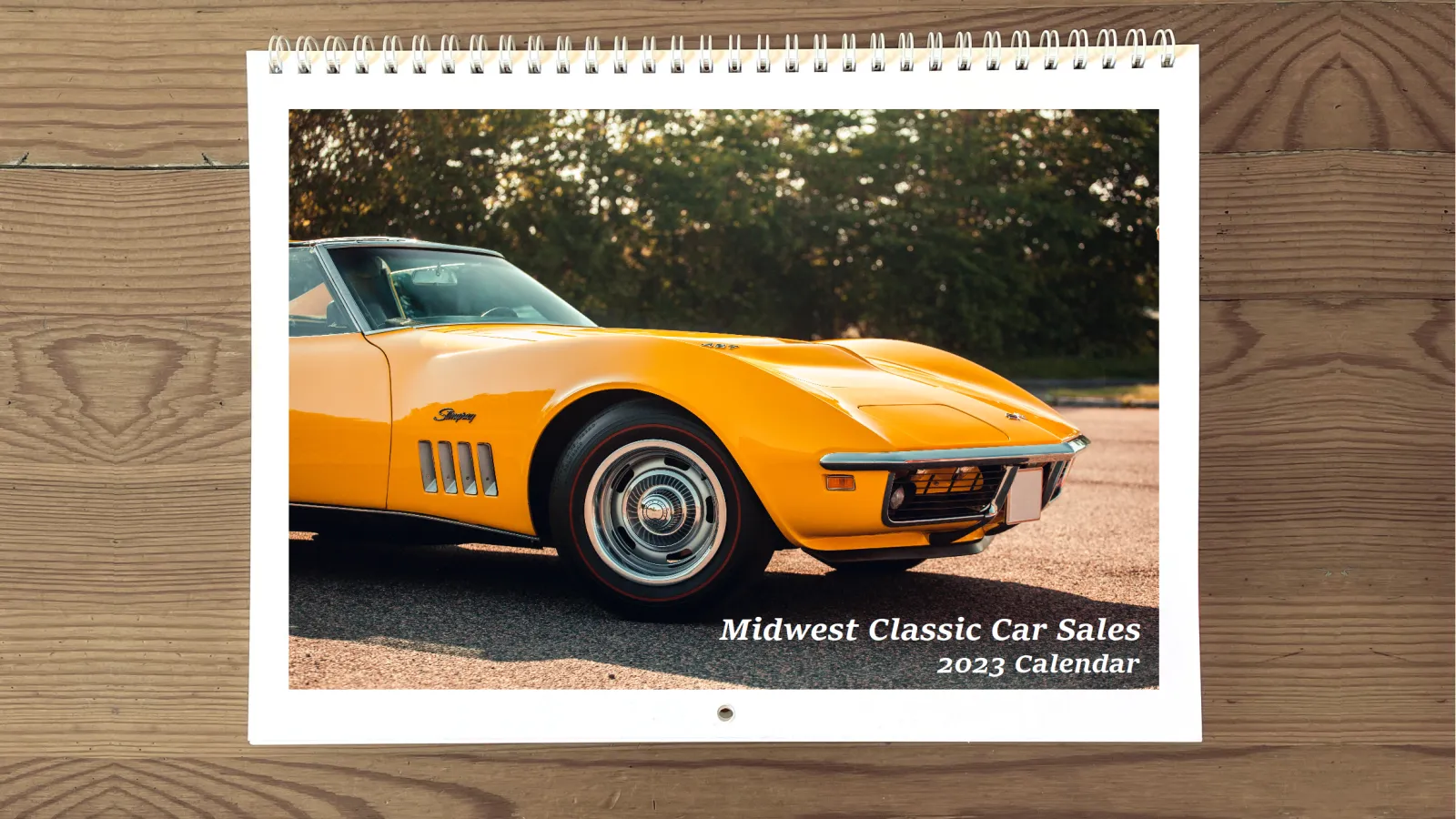 A promotional Calendar displaying a yellow sports car