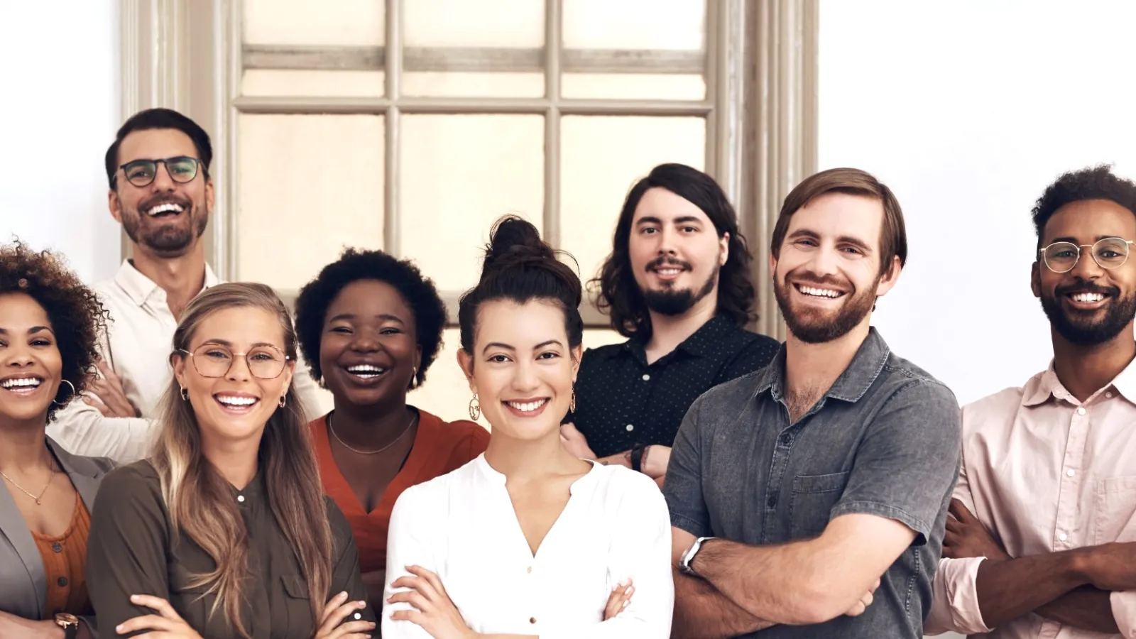 A group of eight smiling Customers.