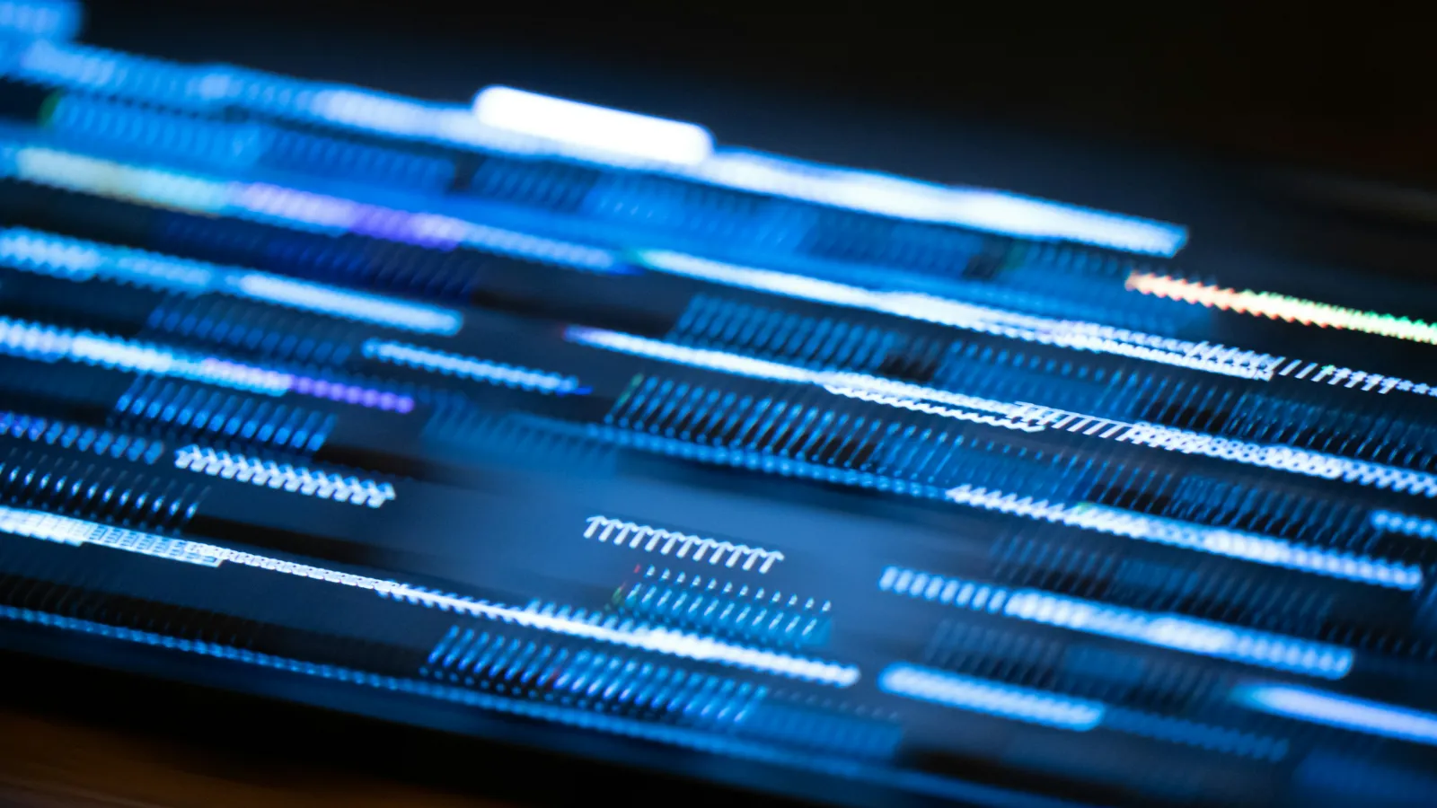 Abstract blue digital light streaks representing fast data transfer and technology movement.