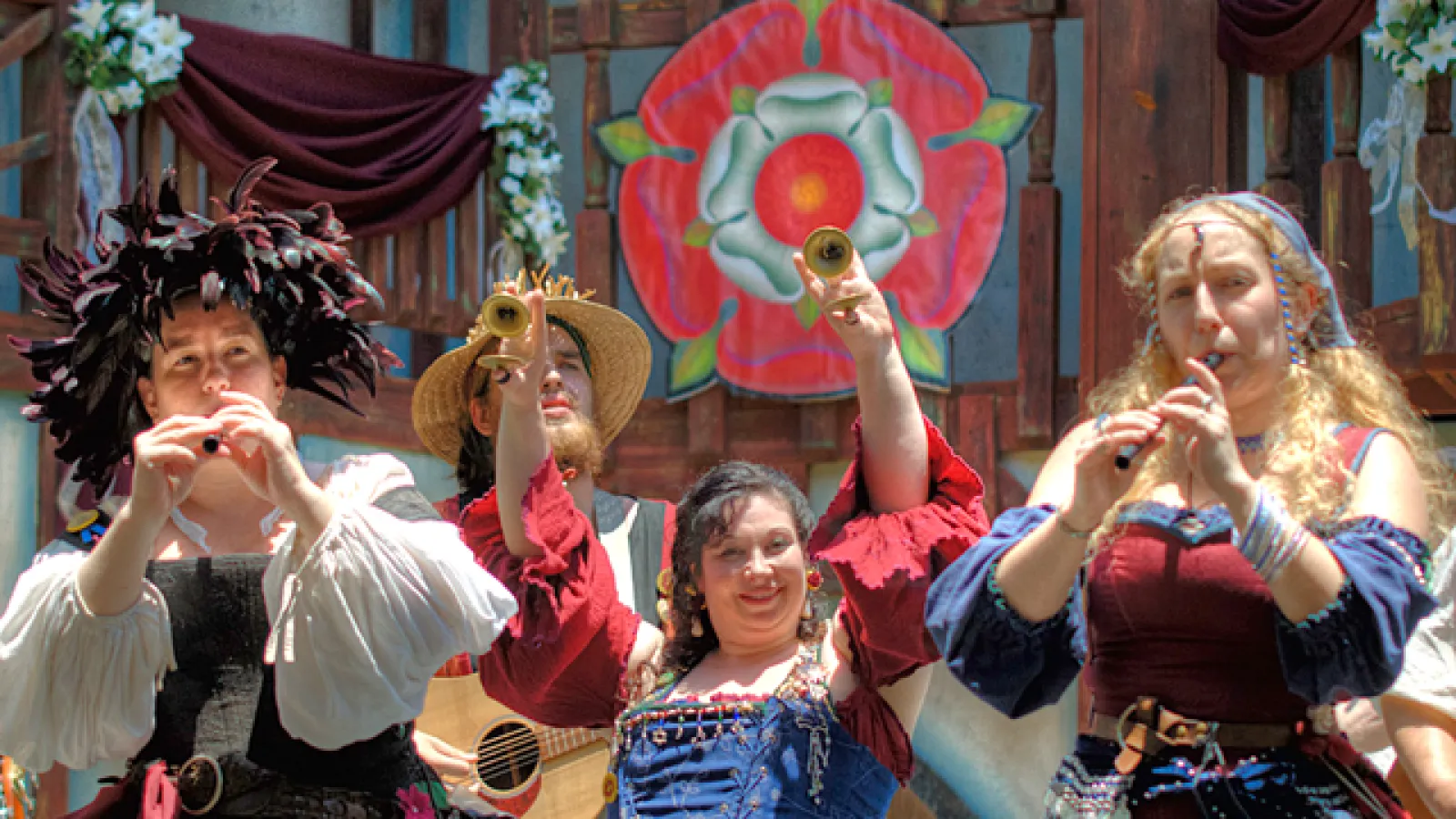 a group of women performing on stage