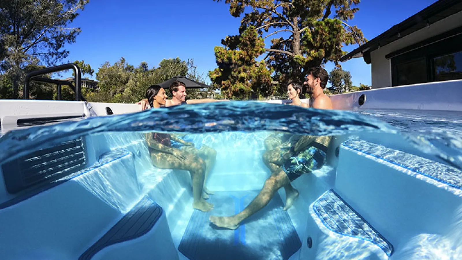 group of people in a swim spa