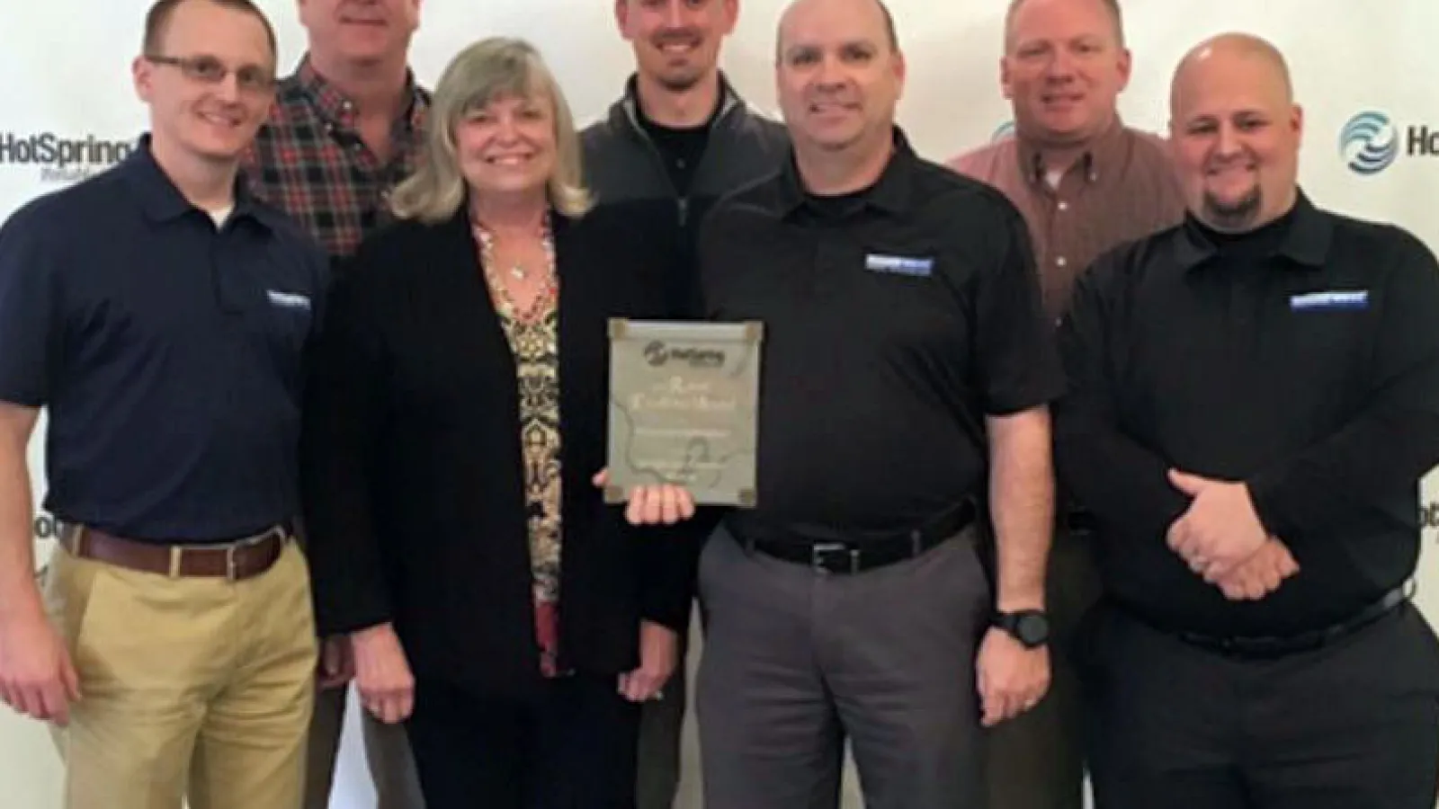 a group of people posing for a photo