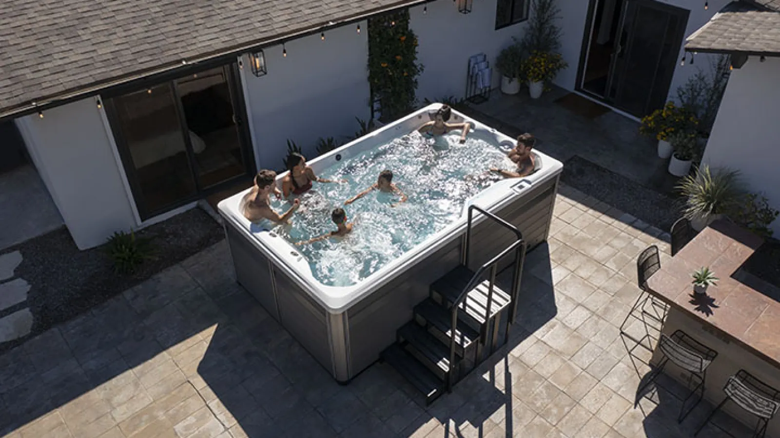 a group of people in a swim spa