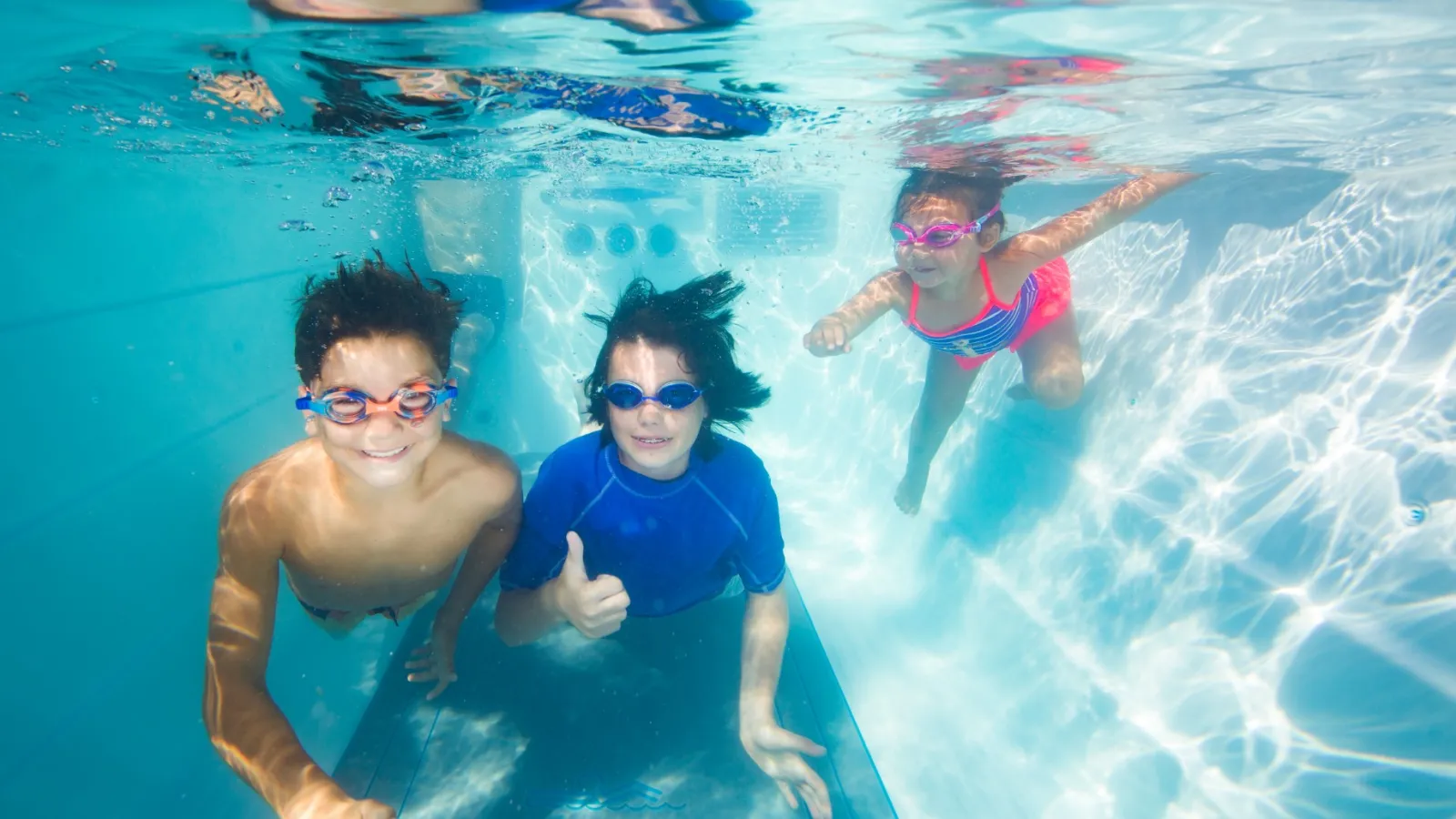 a group of people in a swim spa
