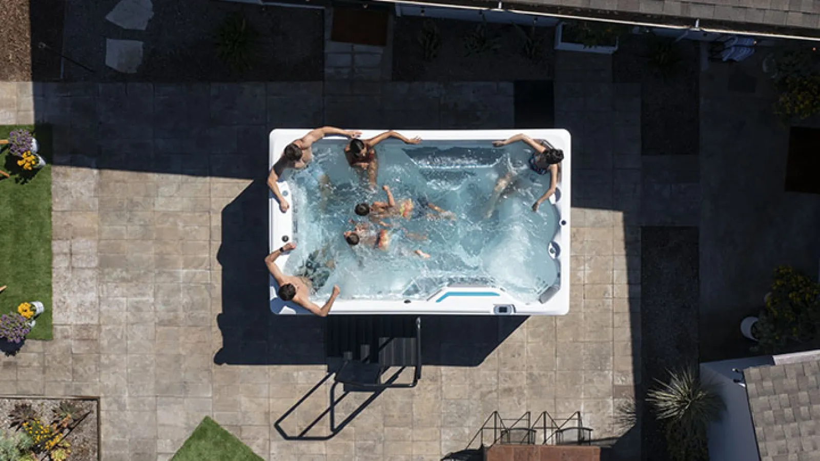 a group of people in a swim spa