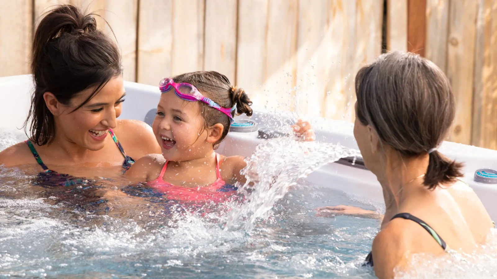 a group of girls in a swim spa