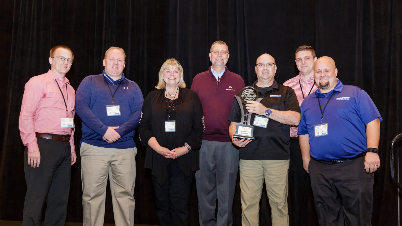 a group of people posing for a photo