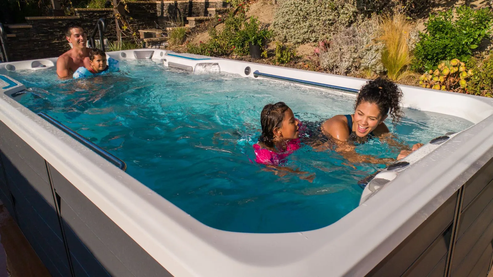 a group of people in a swim spa