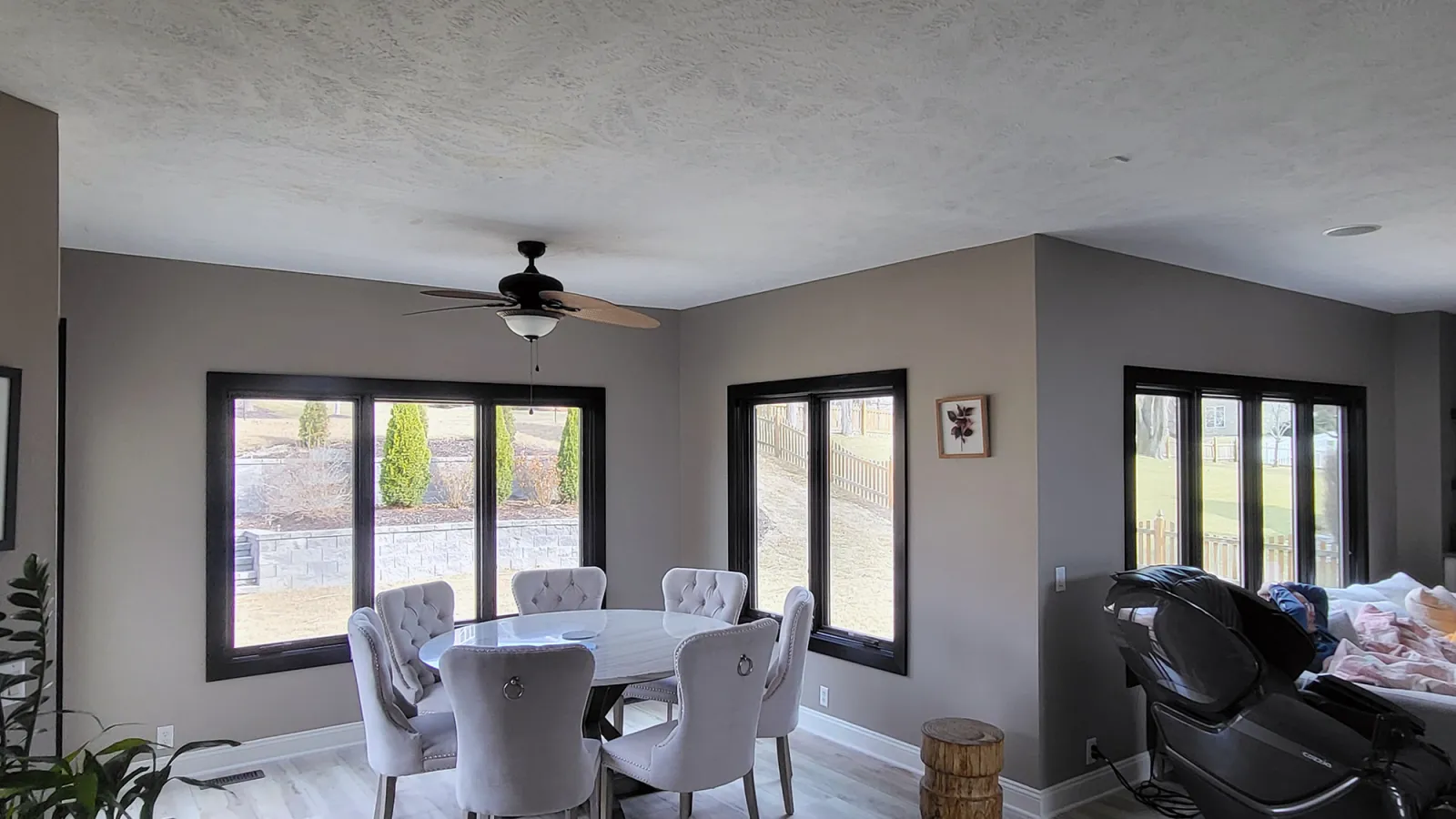 a room with a table and chairs