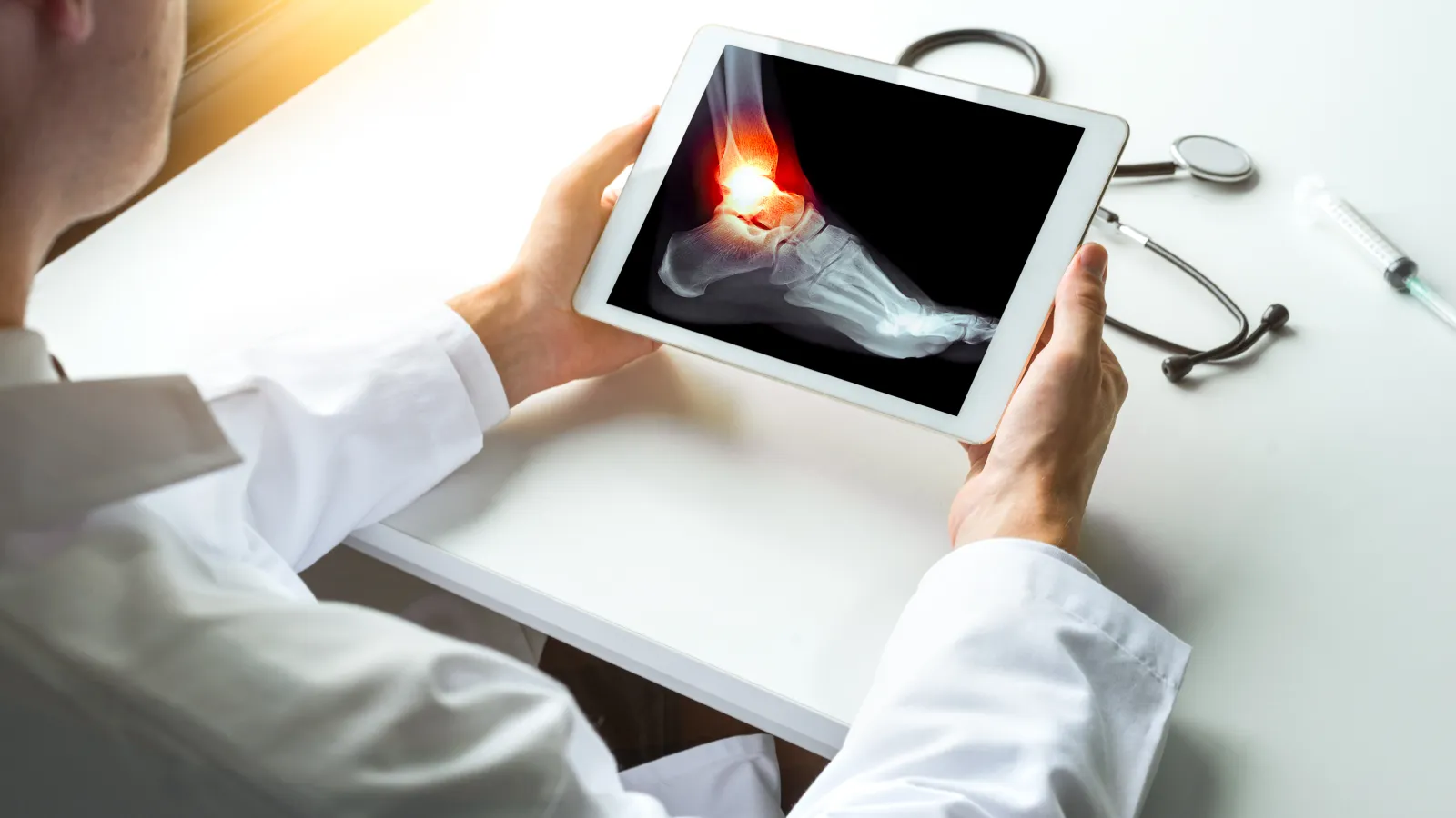 a person holding a tablet