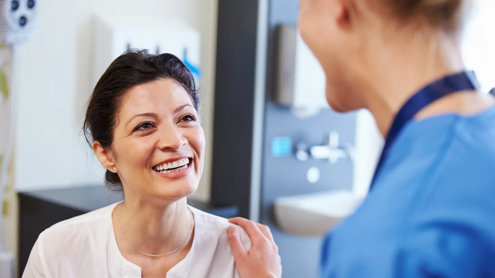 a doctor talking to a patient