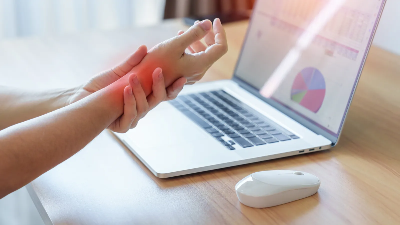 a person holding their wrist