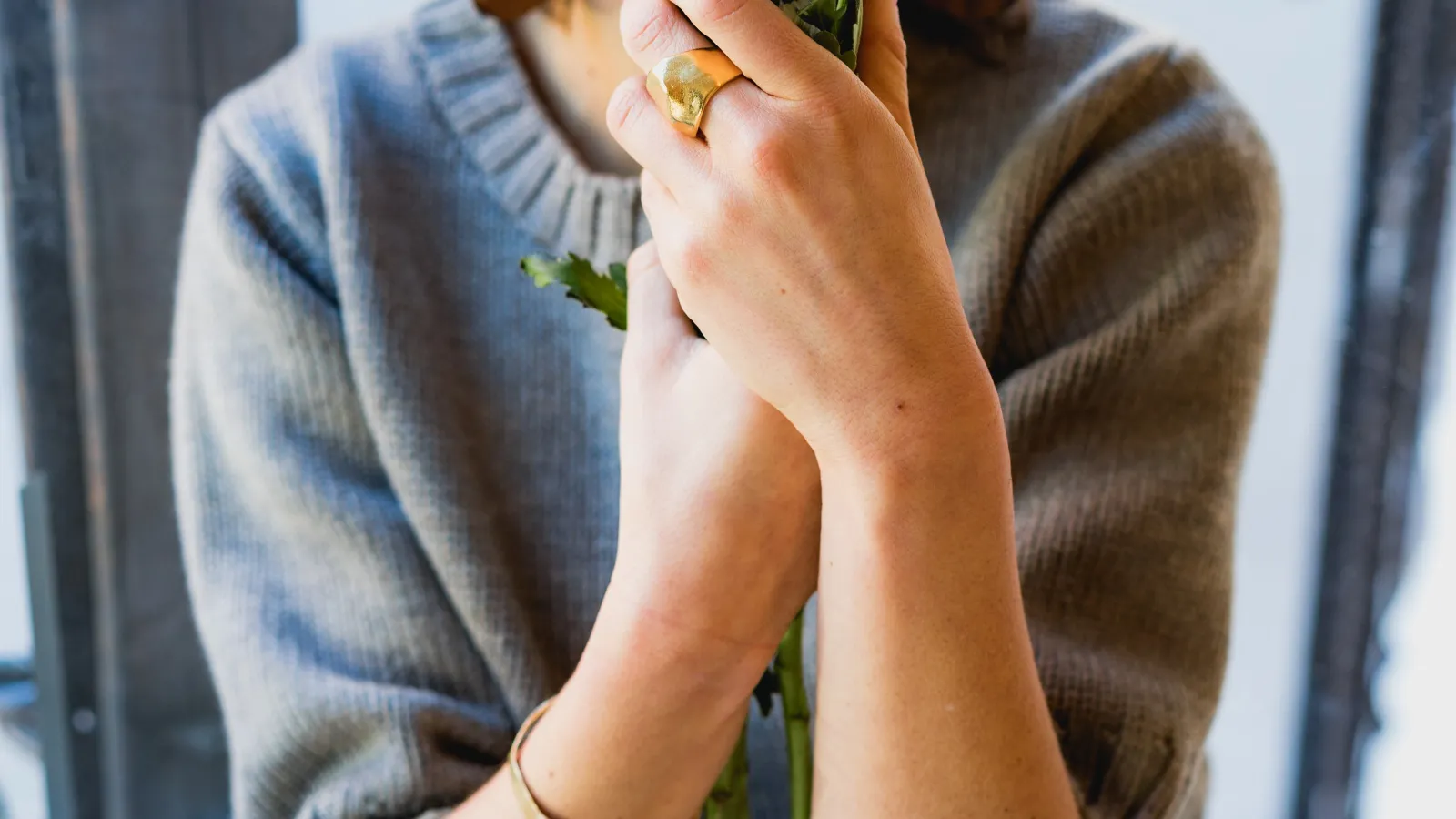 a person holding flowers