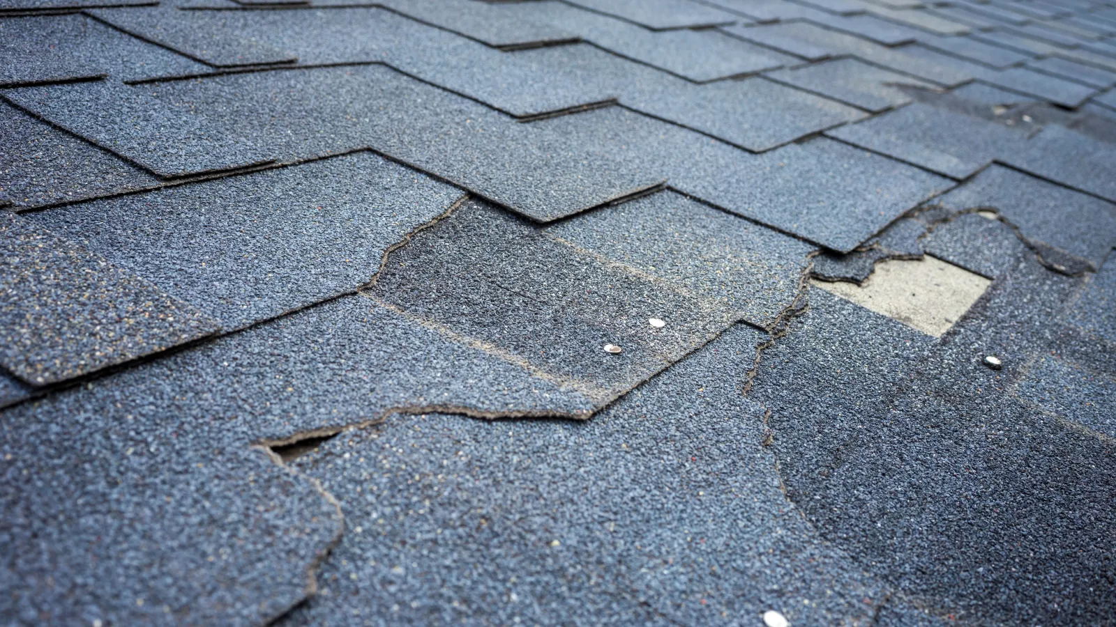 a roof with cracks from improper roofing seen during Drone Inspections, Home Inspection in Atlanta Georgia, Home Inspector Atlanta