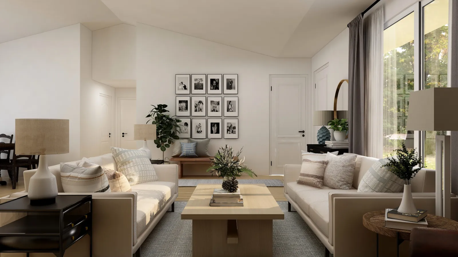 a living room with a white couch and a white table