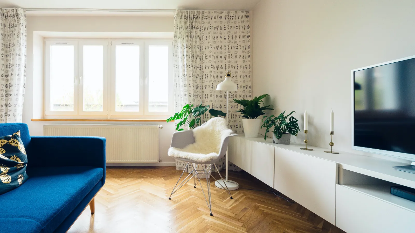 a living room with a tv and a couch