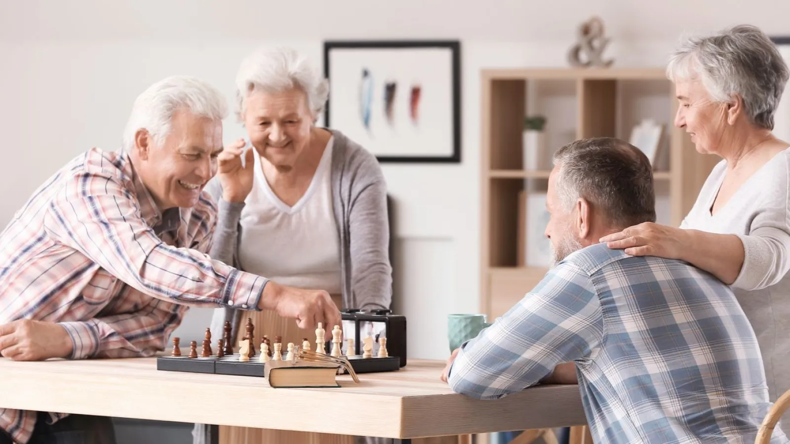 a group of people sitting around a table