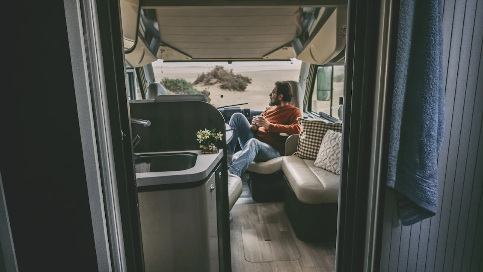 a man sitting inside RV
