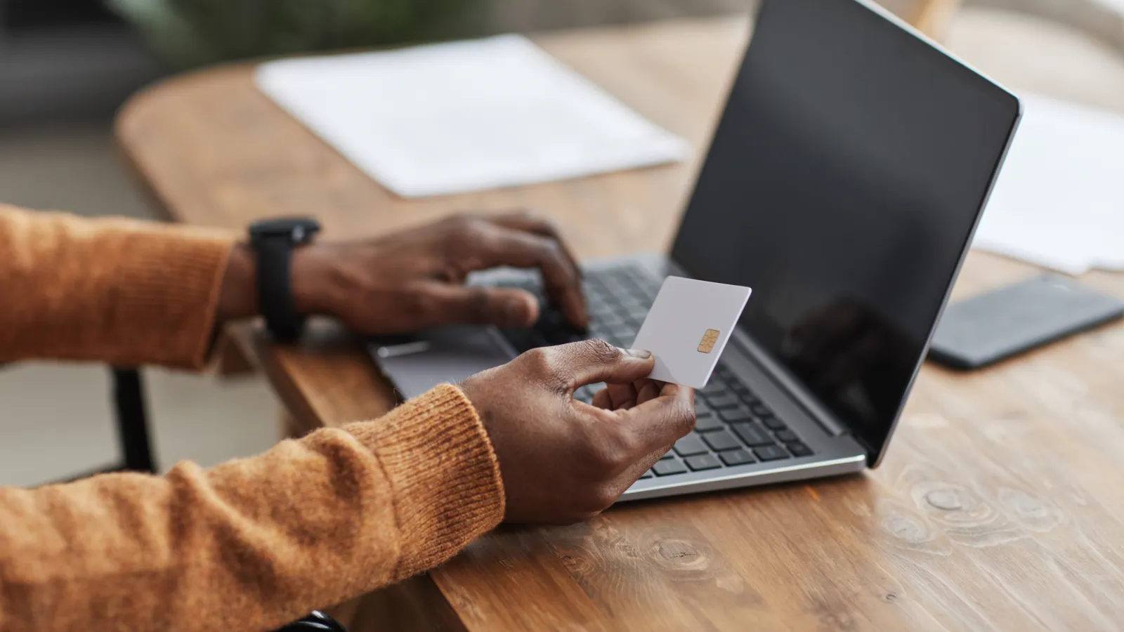 man paying online for storage unit