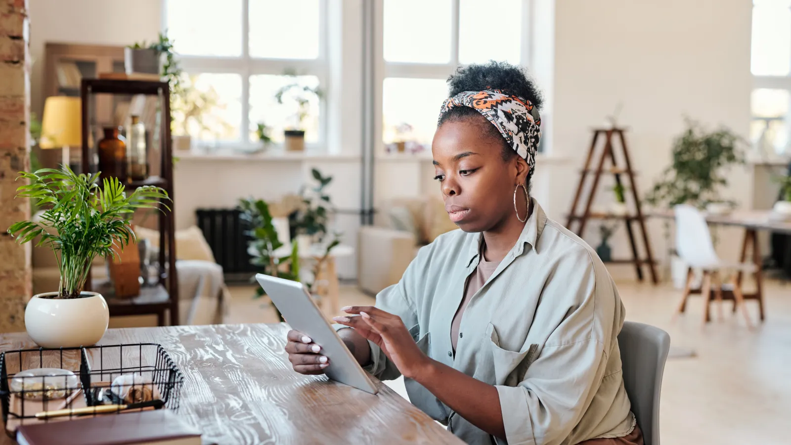 businesswoman sitting at desk in office space