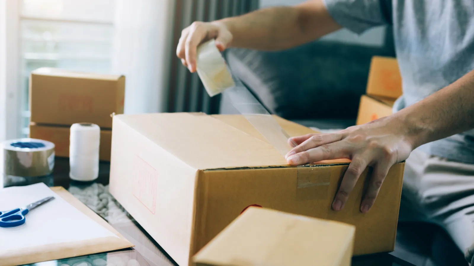 a man opening a box