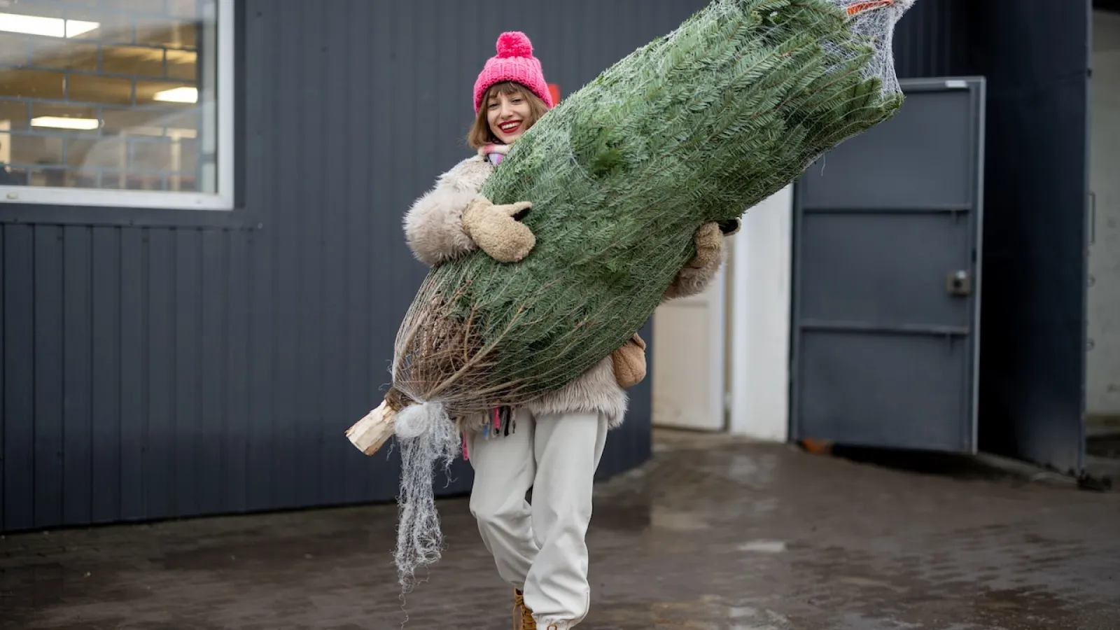 a girl holding a large bird