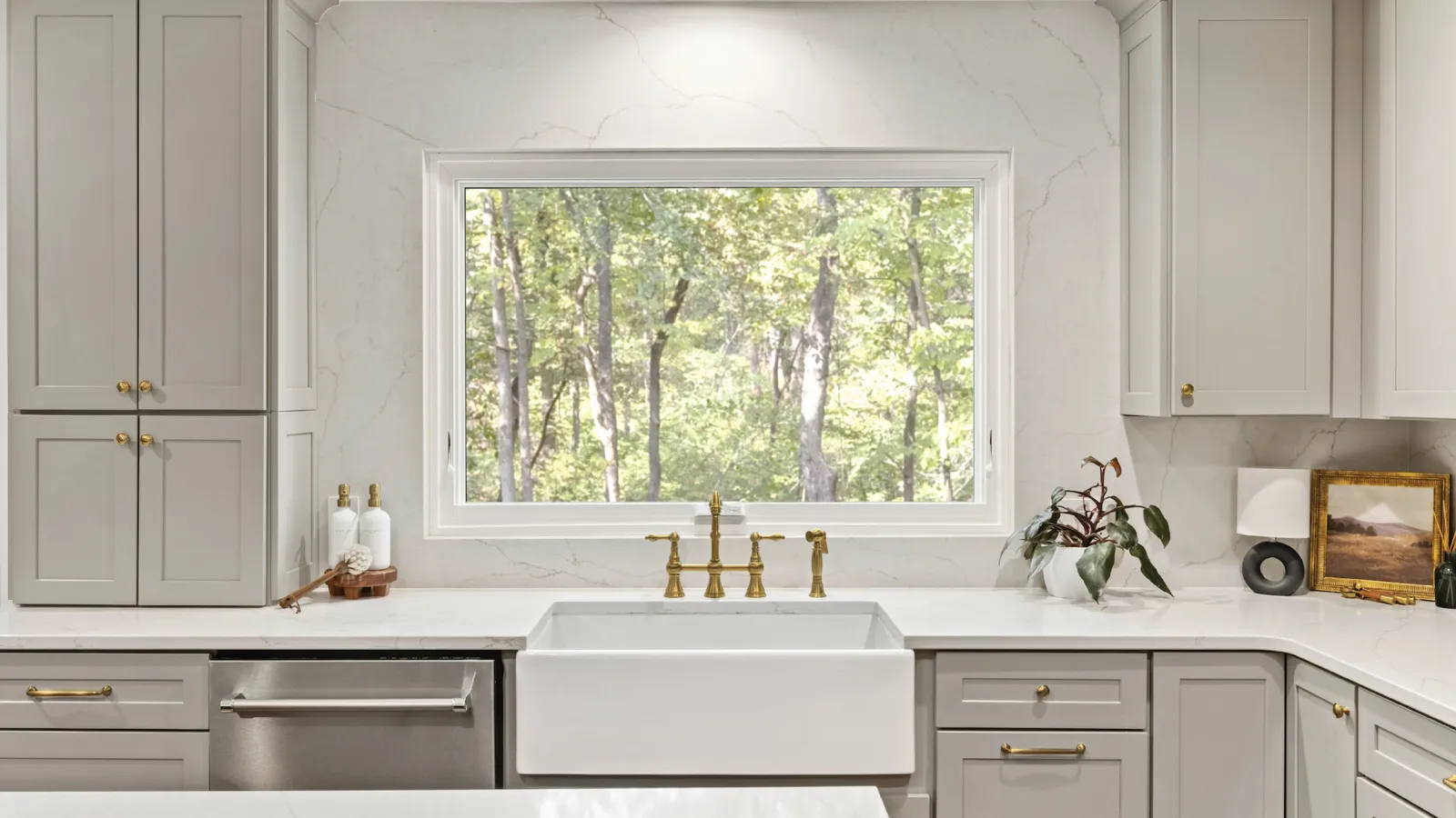 a kitchen with white cabinets