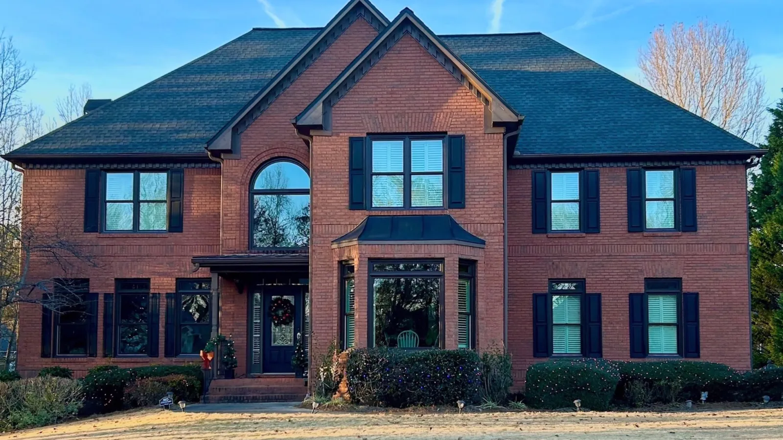 a brick building with a driveway