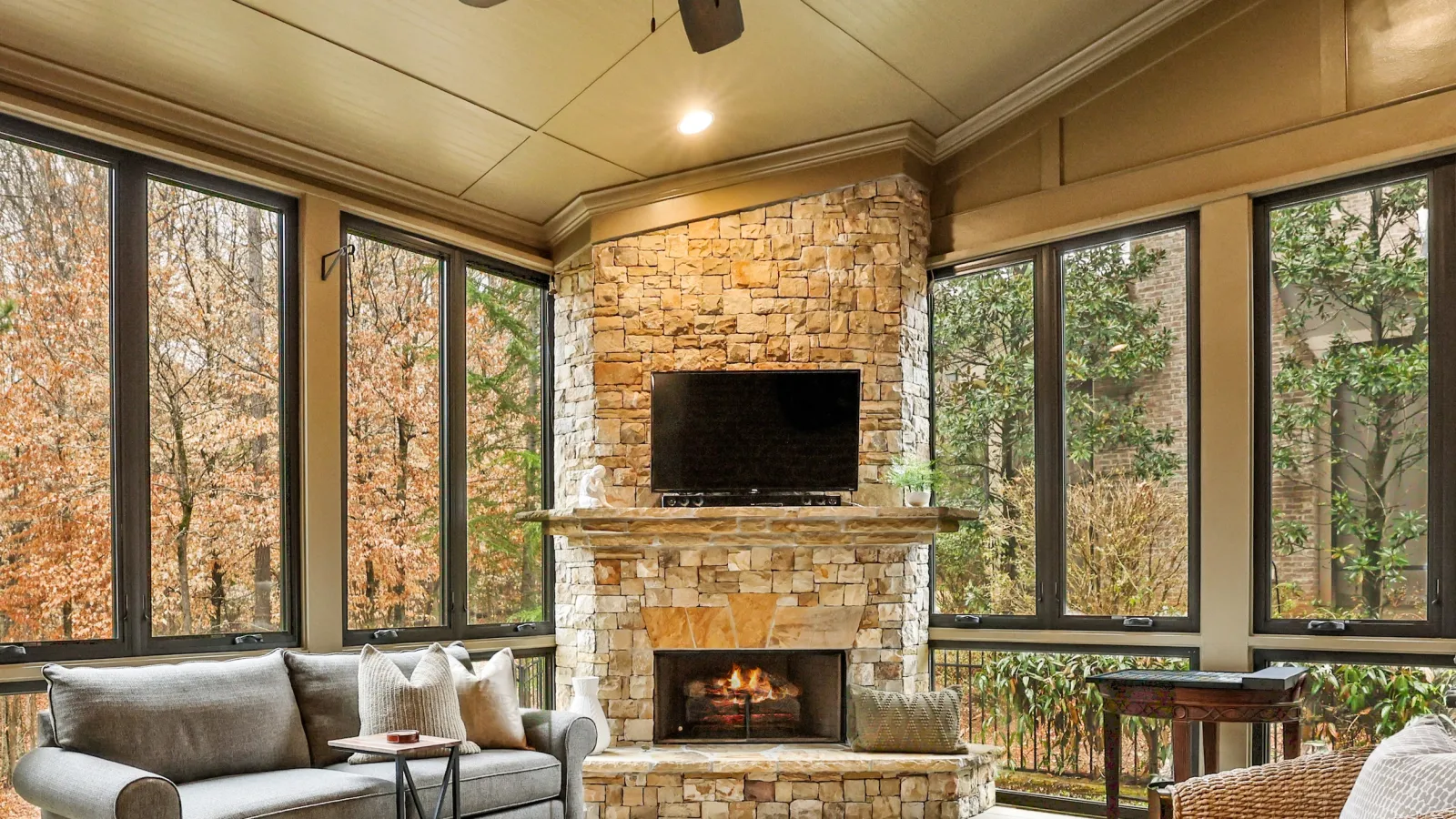 a sunroom with fiberglass replacement windows