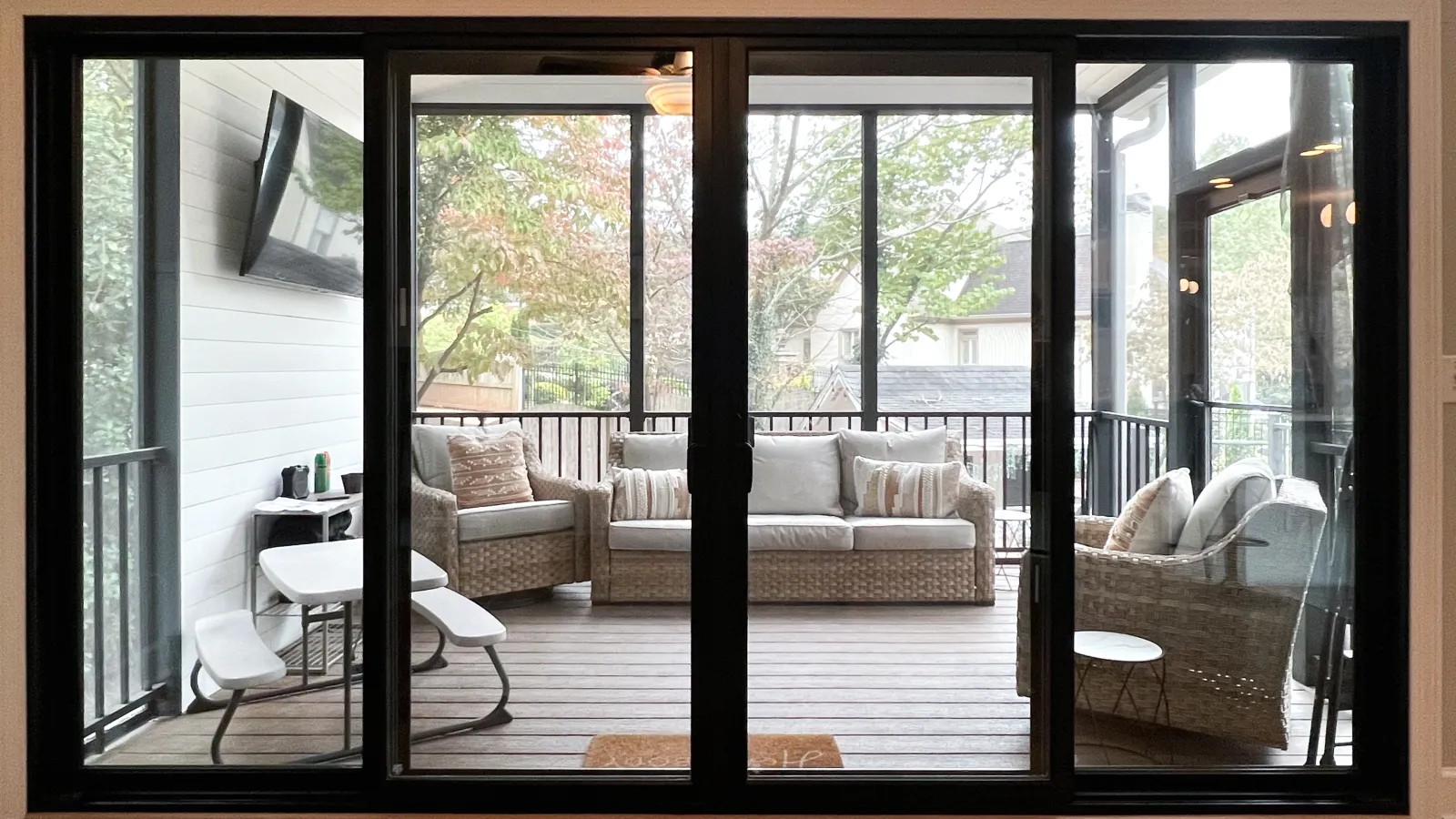 a living room with a large glass door