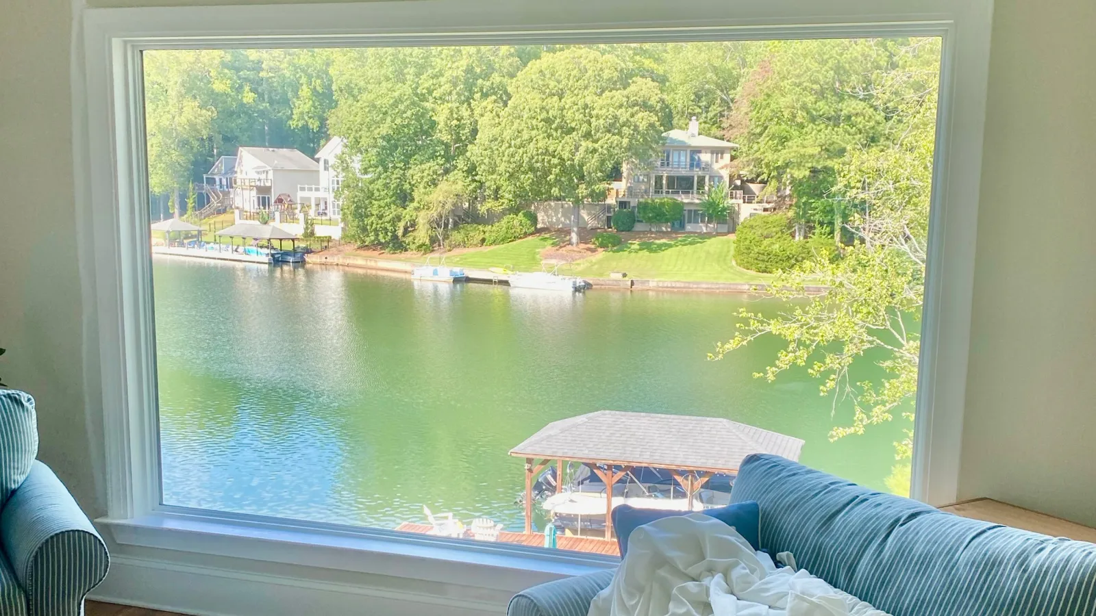 The large Infinity from Marvin fiberglass picture window replaced the smaller windows for an uninterrupted view of the lake and dock