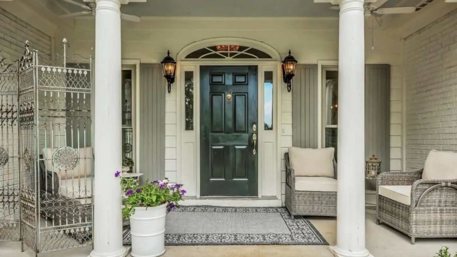 a house with a gate and a door