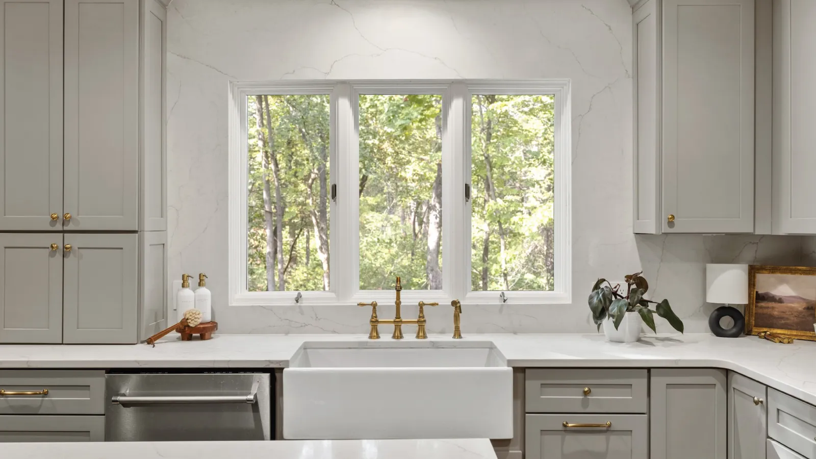 a kitchen with white cabinets