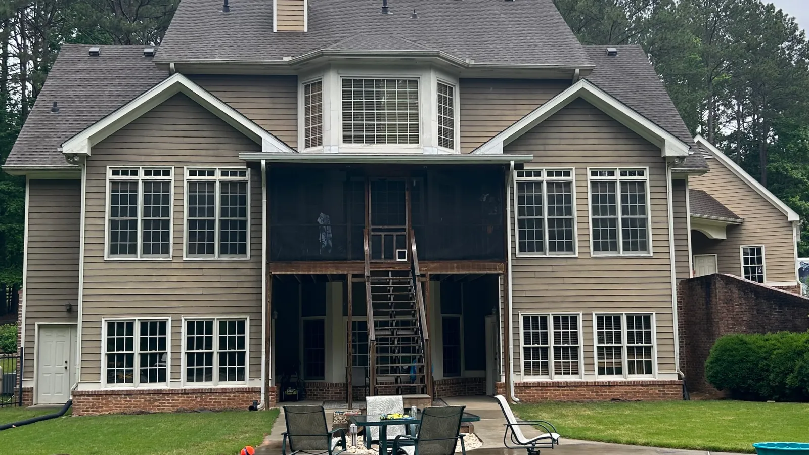 a house with a patio and tables