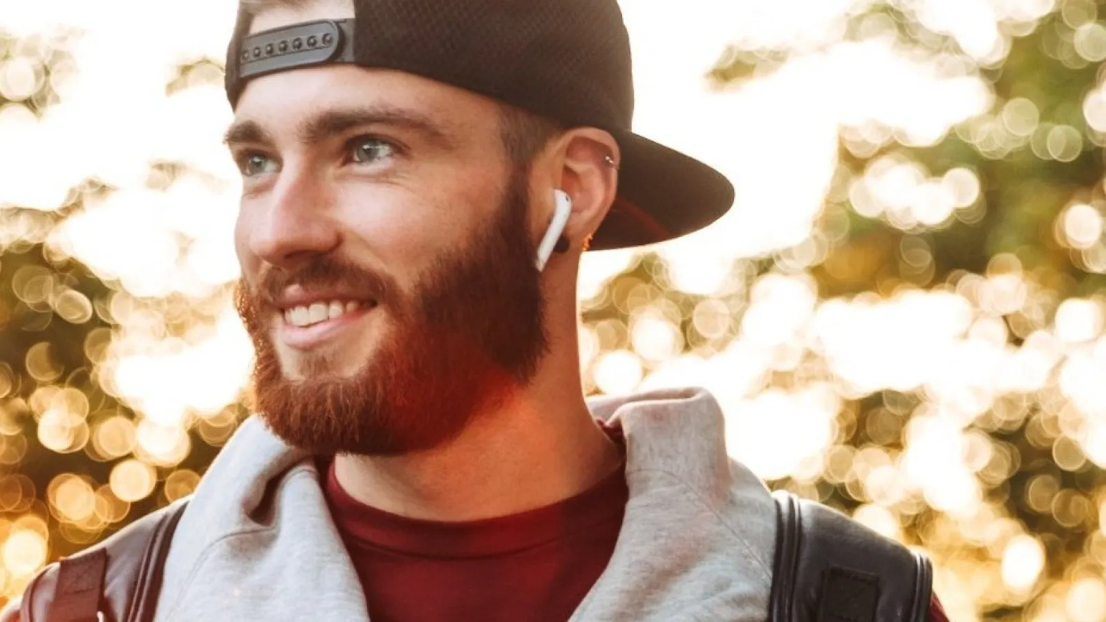 a man holding a red phone