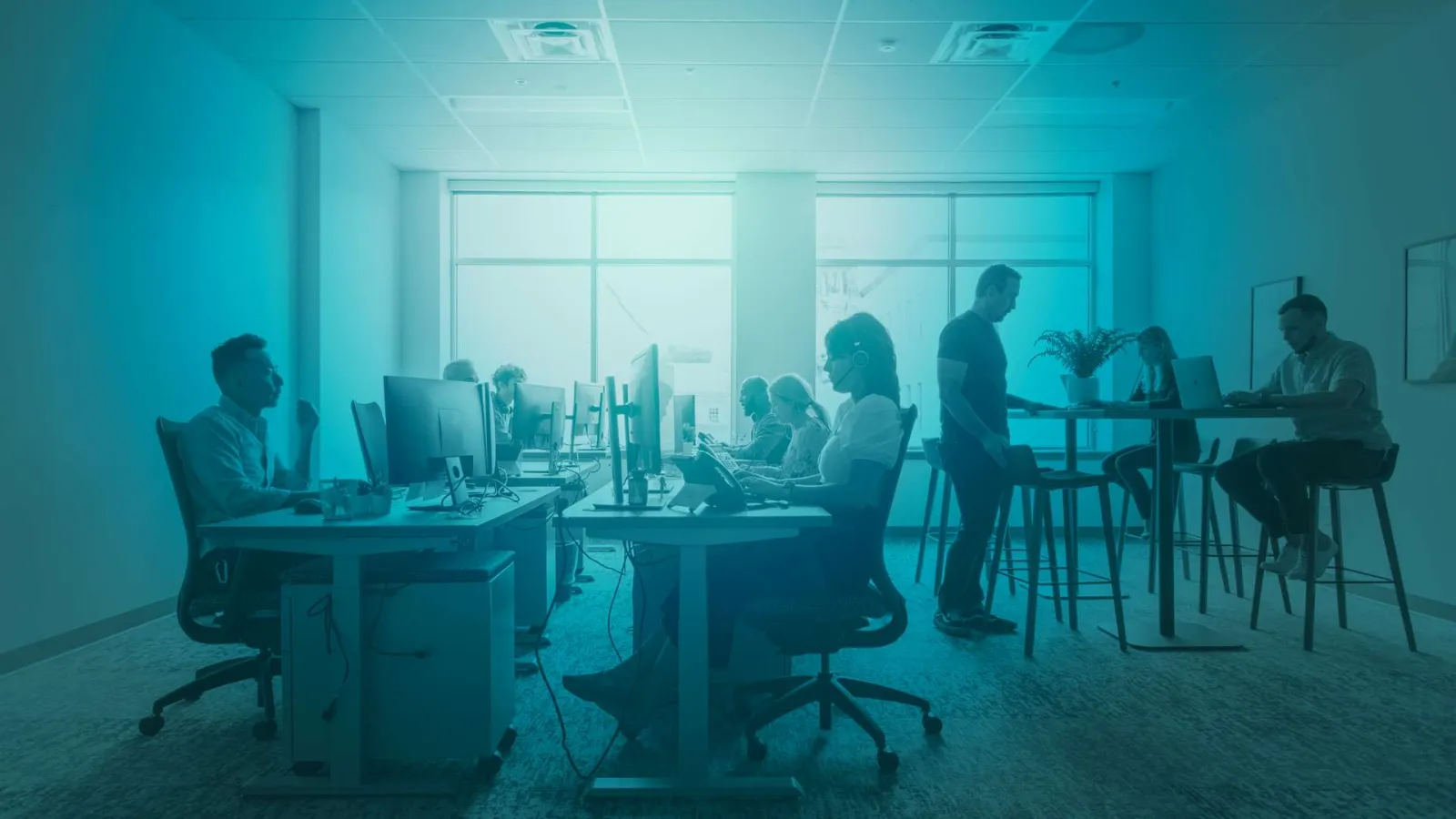 a person in a blue chair in a room
