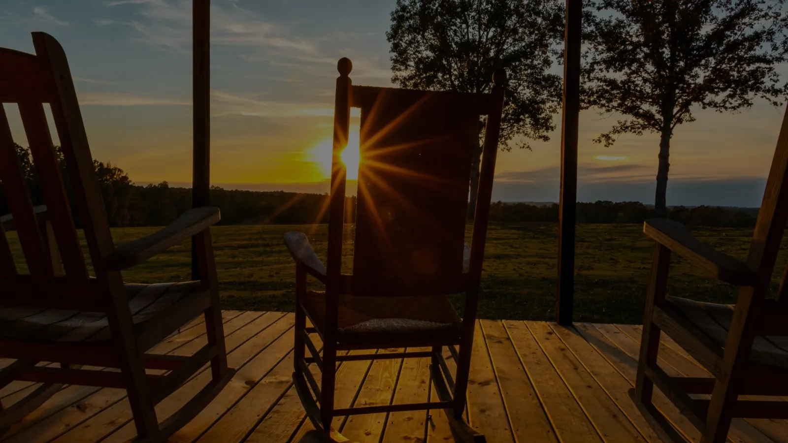 a group of chairs on a deck